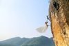 woman in dress on cliff.jpeg